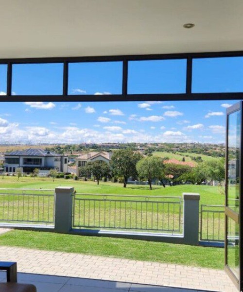 6-Panel-Folding-Door-in-Bronze-with-mid-rail-and-a-fixed-top-light-2