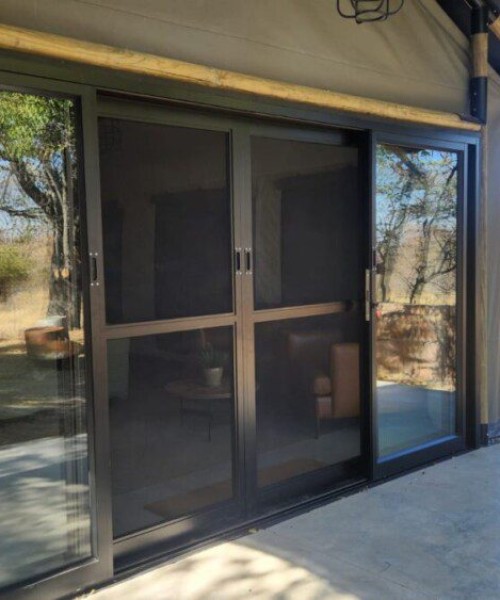Heavy-duty-palace-double-sliding-door-with-flush-pull-handles-and-mosquito-screen-door-with-mid-rail-in-black-6