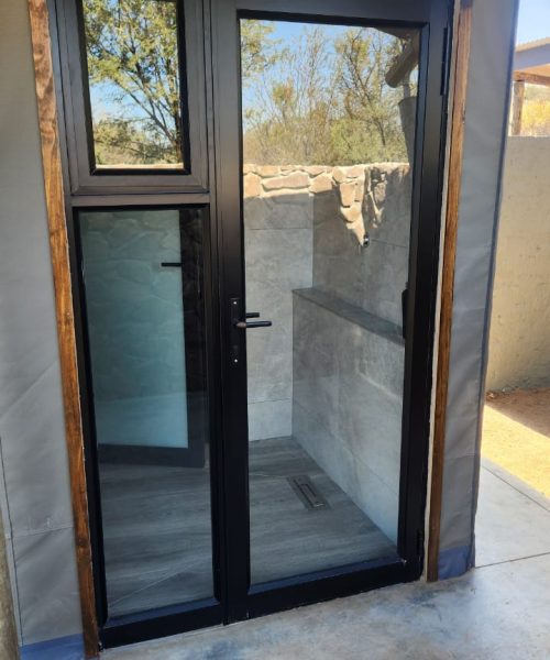 Hinged-Door-with-a-side-light-and-an-insert-with-fly-screen-in-black-10