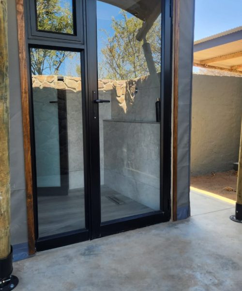 Hinged-Door-with-a-side-light-and-an-insert-with-fly-screen-in-black-9