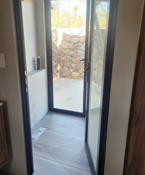 Hinged-Single-Door-with-white-trans-glass-in-black-2
